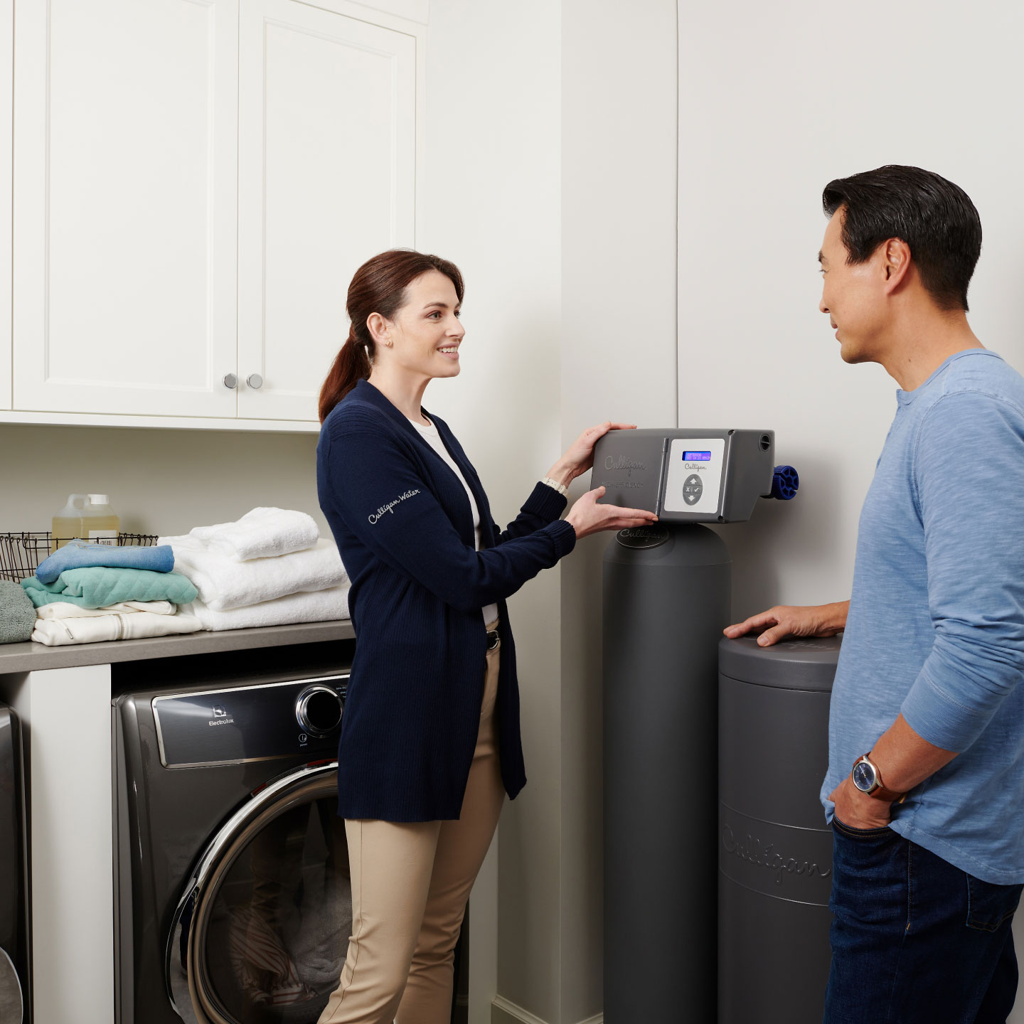 Culligan Dealer Explaining to a Customer how a Water Softener Works