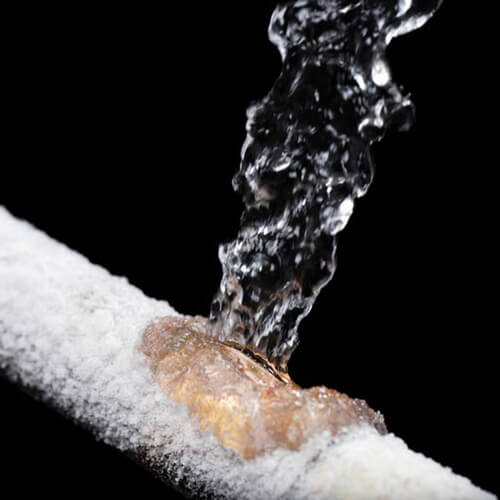 water falling on pipe, causing it to freeze which is best to prevent to avoid costly damages