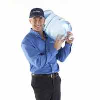 Culligan man delivering a 5 gallon bottle of fresh water