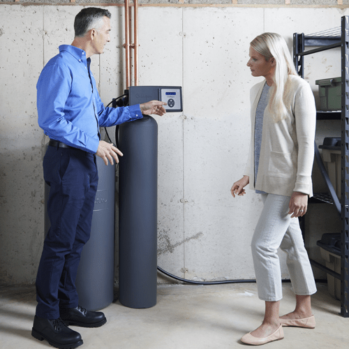 Culligan employee installing a water softener for a customer