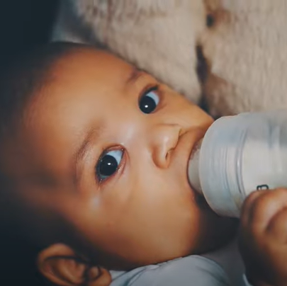 baby drinking bottle with filtered water