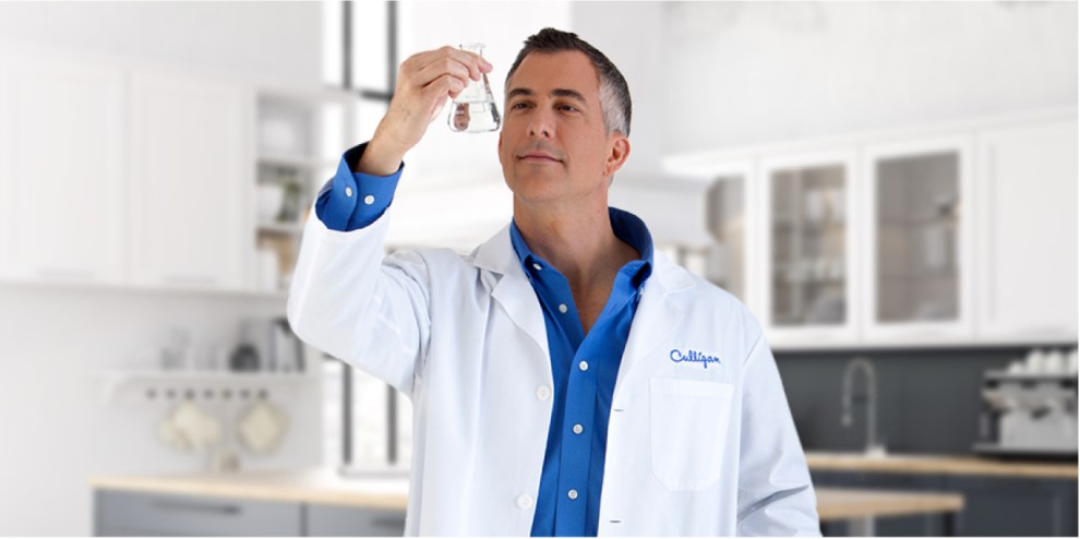 Culligan Expert testing water at a customer's home