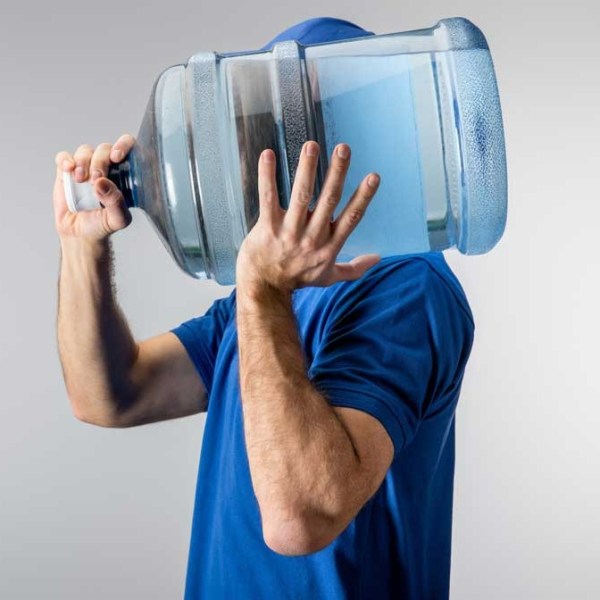 Culligan expert delivering 5-gallon water jug