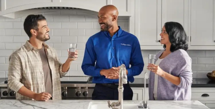 Couple and Culligan expert discussing their clean filtered water